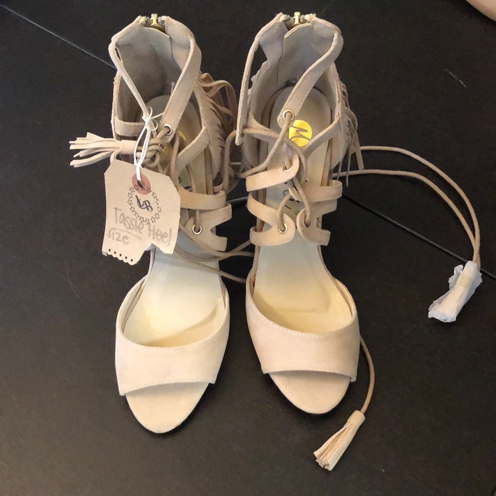Fringe lace up peep toe pumps